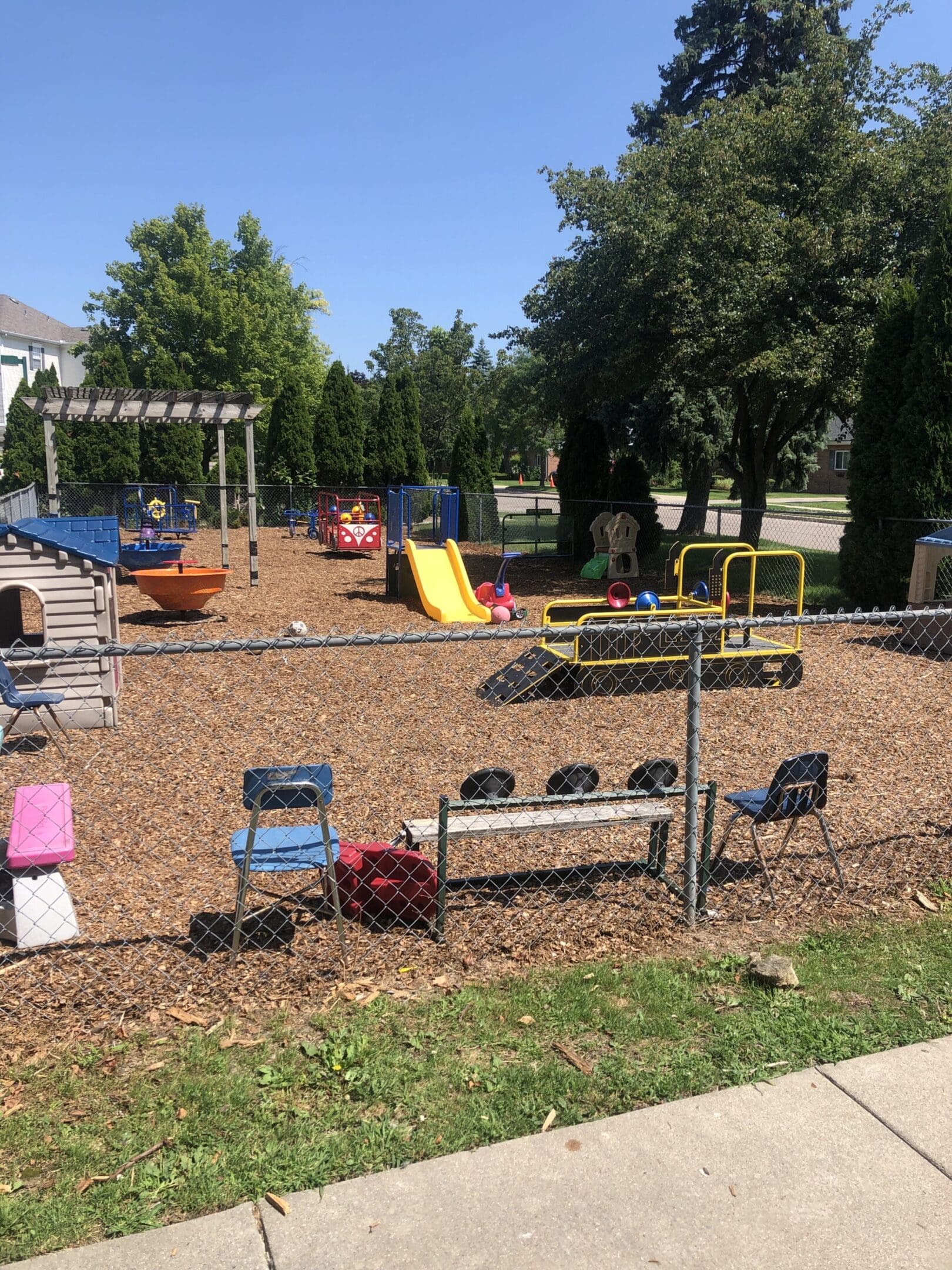 A playground with many different types of equipment.